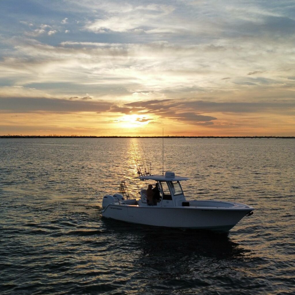 Elevate Your Summer Boating Adventures: Fun-Filled Activities Await, boating, yachting, summer boating activities, summer boating, off the hook yachts, fishing off a boat, sunset boating